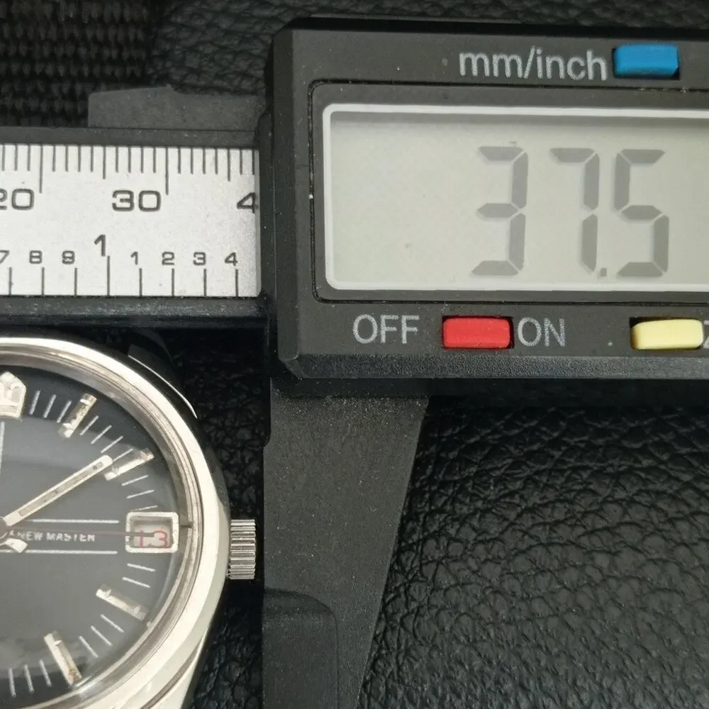 Vintage 1985 Citizen Manual Wound Mens Silver Watch W/Date & Black accents